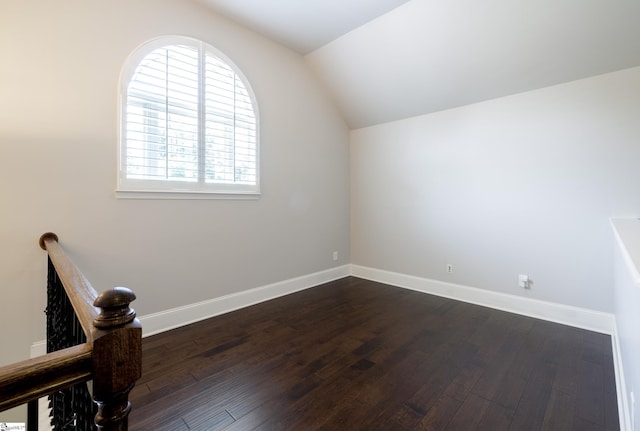 215 Wando Way, Greer, SC 29650 - additional living space with vaulted ceiling and dark wood-type flooring