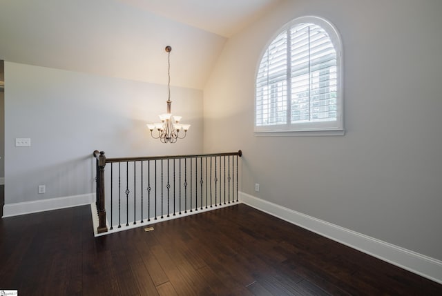 215 Wando Way, Greer, SC 29650 - unfurnished room with a chandelier, wood finished floors, and vaulted ceiling