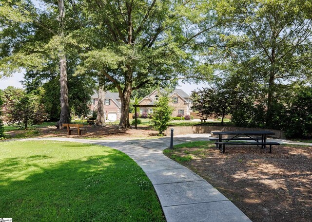 215 Wando Way, Greer, SC 29650 - surrounding community with a lawn