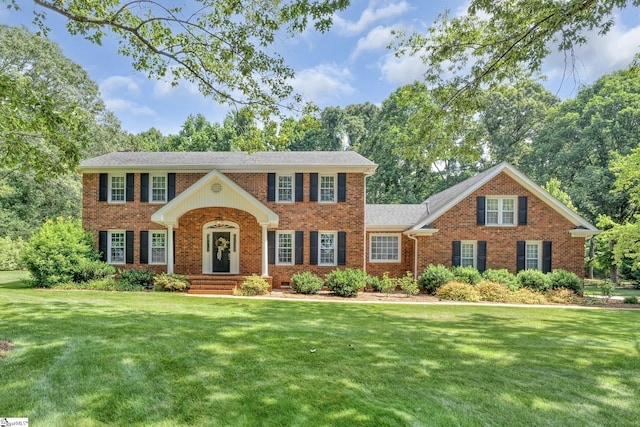 111 Brandon Way, Simpsonville, SC 29681 - view of front facade with brick siding and a front yard