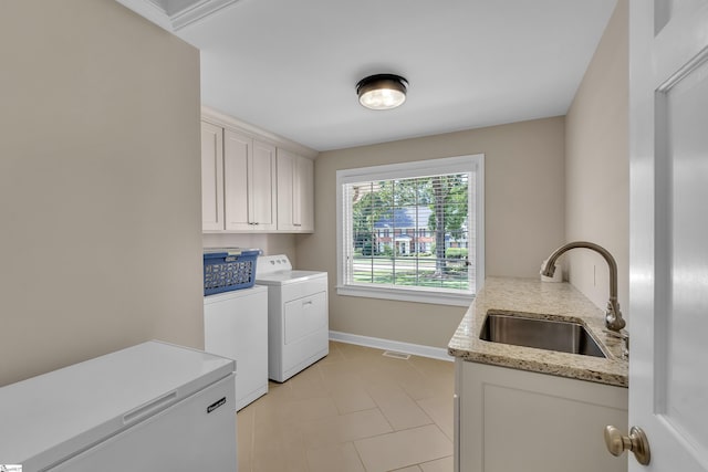111 Brandon Way, Simpsonville, SC 29681 - laundry area featuring washer and dryer, cabinet space, and light tile patterned floors