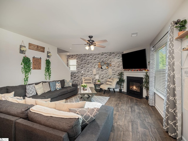 126 Blue Springs Way, Simpsonville, SC 29680 - living area with dark wood-style flooring, a ceiling fan, and a fireplace with flush hearth