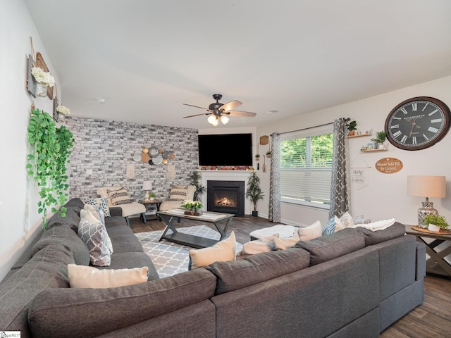 126 Blue Springs Way, Simpsonville, SC 29680 - living area featuring dark wood finished floors, a ceiling fan, and a glass covered fireplace