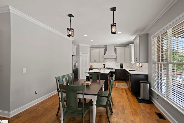 6 Mandarin Cir, Taylors, SC 29687 - dining room with light wood-style floors, crown molding, and recessed lighting