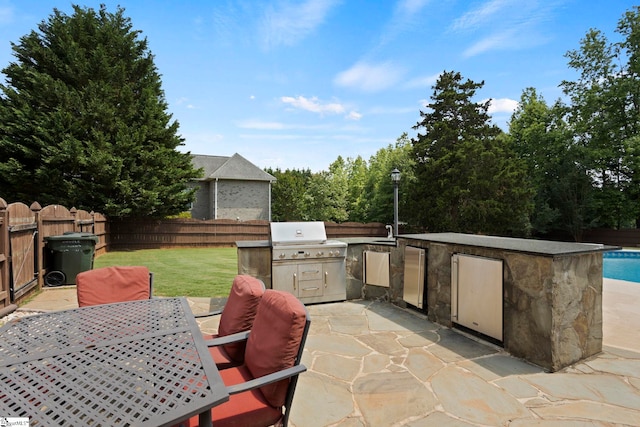 6 Mandarin Cir, Taylors, SC 29687 - fenced backyard with area for grilling, a patio area, and outdoor dining space