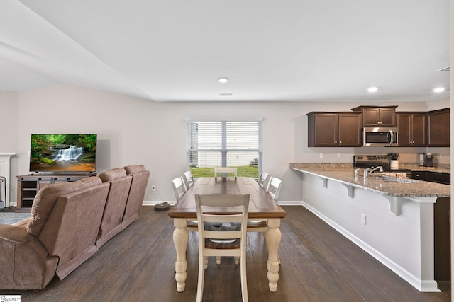 259 Millen Dr, Woodruff, SC 29388 - dining area with dark wood-type flooring and recessed lighting