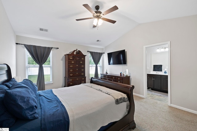 259 Millen Dr, Woodruff, SC 29388 - bedroom featuring light colored carpet, multiple windows, lofted ceiling, ensuite bathroom, and a ceiling fan