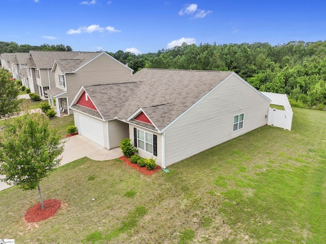 259 Millen Dr, Woodruff, SC 29388 - view of front of property with a garage, roof with shingles, driveway, and a front lawn