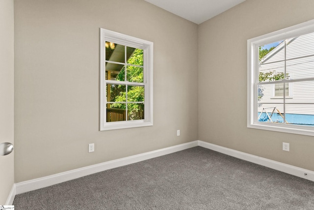 1231 Apalache St, Greer, SC 29651 - unfurnished room featuring dark colored carpet and healthy amount of natural light