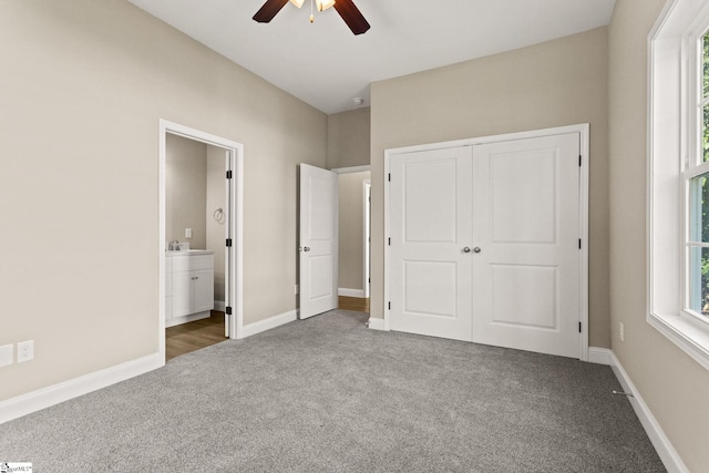 1231 Apalache St, Greer, SC 29651 - unfurnished bedroom featuring carpet floors, a closet, ensuite bathroom, and ceiling fan