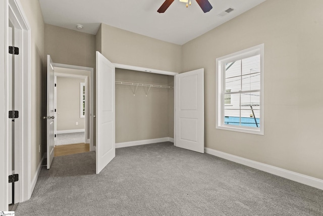 1231 Apalache St, Greer, SC 29651 - unfurnished bedroom featuring carpet floors, a closet, and a ceiling fan