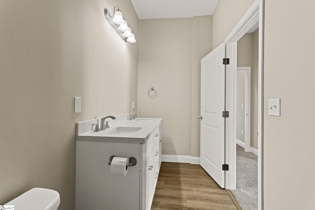1231 Apalache St, Greer, SC 29651 - bathroom with double vanity and wood finished floors