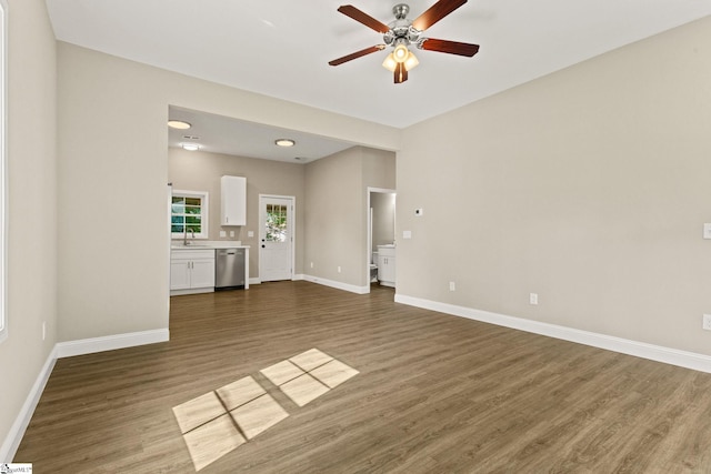 1231 Apalache St, Greer, SC 29651 - unfurnished living room featuring a ceiling fan and wood finished floors
