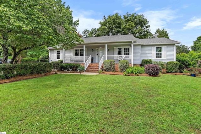 217 Devenger Rd, Greer, SC 29650 - view of front facade with a porch, a front yard, and roof with shingles