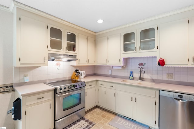 217 Devenger Rd, Greer, SC 29650 - kitchen with appliances with stainless steel finishes, under cabinet range hood, light countertops, tasteful backsplash, and recessed lighting