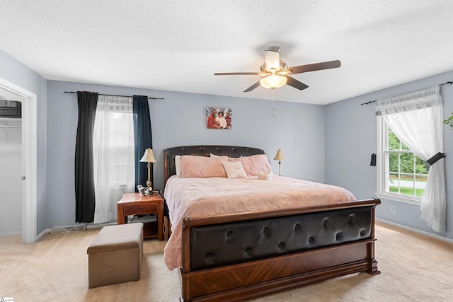 217 Devenger Rd, Greer, SC 29650 - bedroom with light colored carpet, a ceiling fan, and a textured ceiling