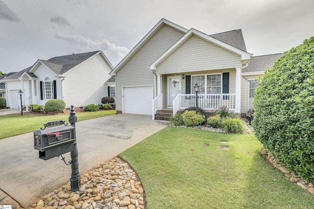 110 Baldwin Pl, Easley, SC 29642 - view of front of house with covered porch, driveway, a garage, and a front yard