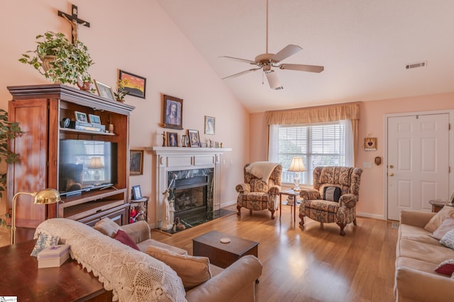 110 Baldwin Pl, Easley, SC 29642 - living room with a fireplace, wood finished floors, ceiling fan, and high vaulted ceiling
