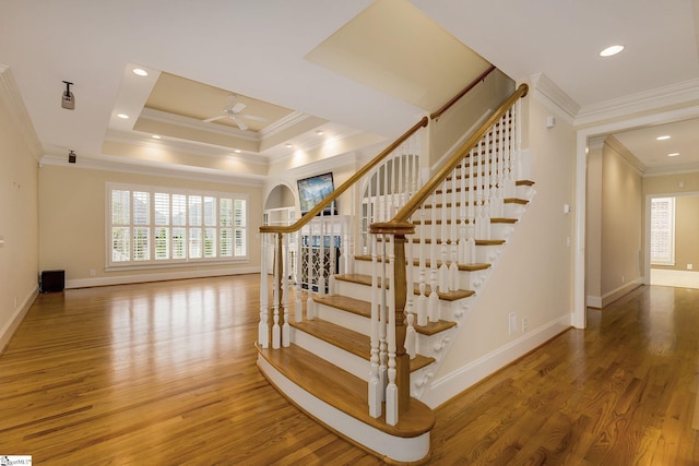 3 Henson Pl, Greer, SC 29650 - stairs featuring wood finished floors, plenty of natural light, a ceiling fan, crown molding, and recessed lighting