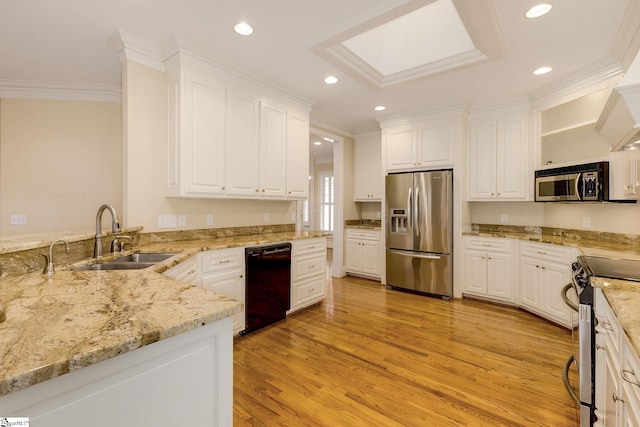 3 Henson Pl, Greer, SC 29650 - kitchen with appliances with stainless steel finishes, crown molding, recessed lighting, white cabinets, and light wood-type flooring