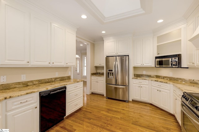 3 Henson Pl, Greer, SC 29650 - kitchen with stainless steel appliances, ornamental molding, white cabinets, recessed lighting, and light wood finished floors