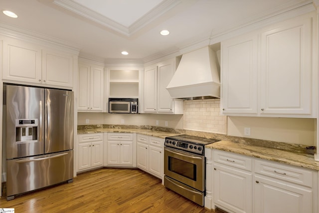3 Henson Pl, Greer, SC 29650 - kitchen with appliances with stainless steel finishes, custom exhaust hood, open shelves, white cabinetry, and recessed lighting