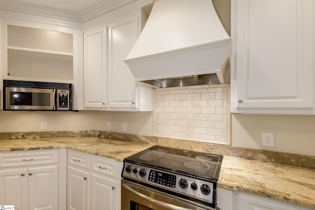 3 Henson Pl, Greer, SC 29650 - kitchen featuring custom range hood, stainless steel appliances, white cabinetry, and tasteful backsplash