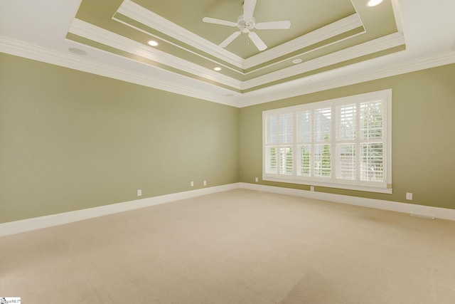 3 Henson Pl, Greer, SC 29650 - unfurnished room with ornamental molding, a tray ceiling, ceiling fan, light carpet, and recessed lighting