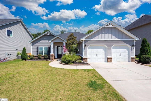 505 E Czardas Way, Woodruff, SC 29375 - craftsman-style home with a garage, driveway, brick siding, board and batten siding, and a front lawn