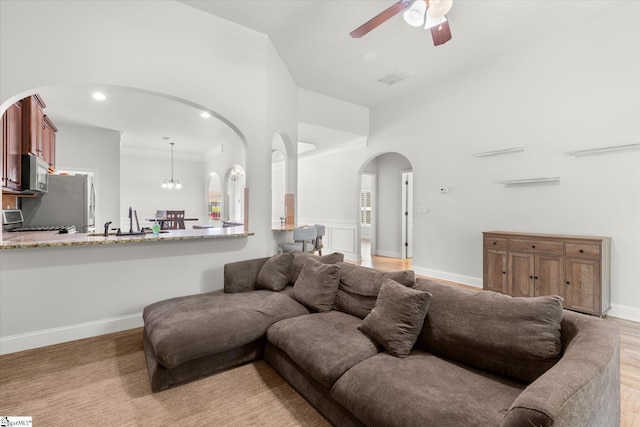 505 E Czardas Way, Woodruff, SC 29375 - living area featuring arched walkways, a ceiling fan, and ornamental molding