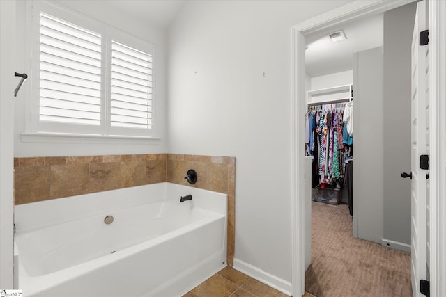 505 E Czardas Way, Woodruff, SC 29375 - bathroom with a garden tub and a walk in closet