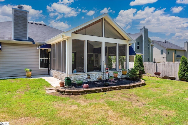 505 E Czardas Way, Woodruff, SC 29375 - rear view of house featuring a sunroom, a chimney, and stone siding