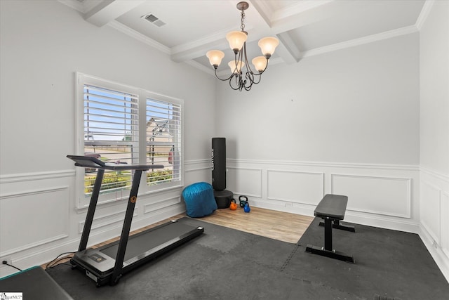 505 E Czardas Way, Woodruff, SC 29375 - exercise room with ornamental molding, a chandelier, a wainscoted wall, and a decorative wall