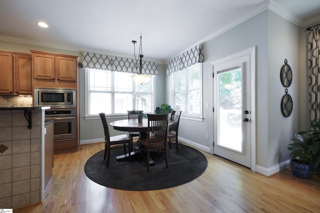 101 Stonewash Way, Greer, SC 29650 - dining space featuring light wood-style flooring and ornamental molding
