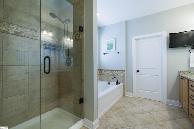 101 Stonewash Way, Greer, SC 29650 - bathroom featuring vanity, a stall shower, and a garden tub