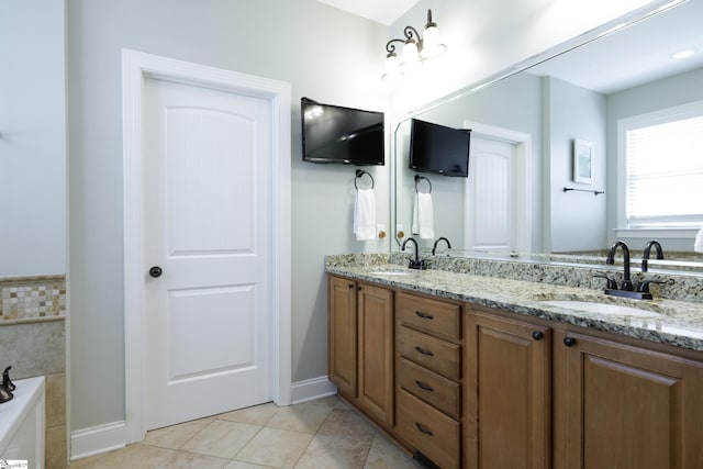 101 Stonewash Way, Greer, SC 29650 - bathroom with double vanity, tile patterned floors, and a tub to relax in