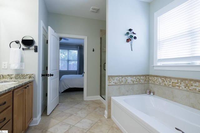 101 Stonewash Way, Greer, SC 29650 - full bath featuring a bath, vanity, a stall shower, ensuite bathroom, and tile patterned flooring