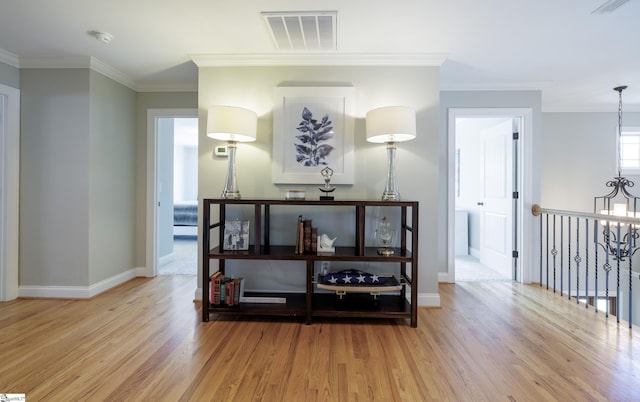 101 Stonewash Way, Greer, SC 29650 - hallway with wood finished floors and crown molding