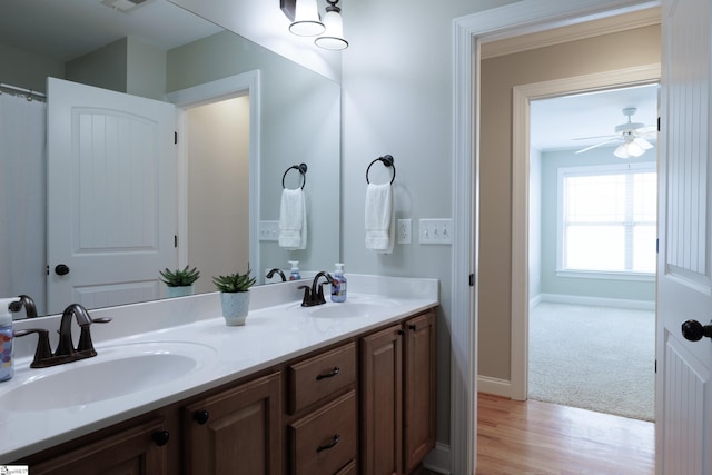 101 Stonewash Way, Greer, SC 29650 - full bathroom featuring double vanity, wood finished floors, and ceiling fan