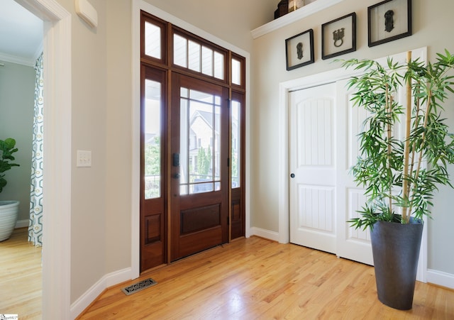 101 Stonewash Way, Greer, SC 29650 - foyer entrance featuring light wood-style floors and ornamental molding