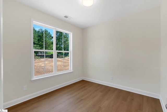 293 Pine Hills Rd, Woodruff, SC 29388 - empty room featuring dark wood-style floors and baseboards