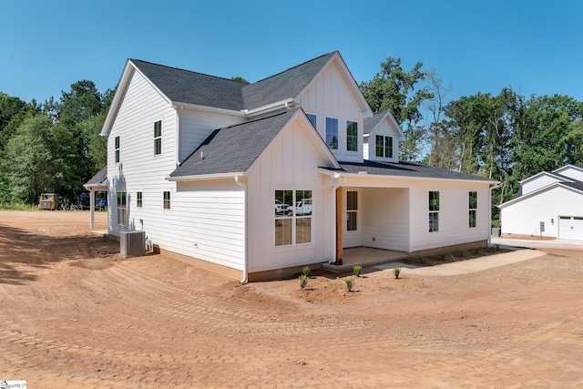 293 Pine Hills Rd, Woodruff, SC 29388 - modern farmhouse style home with board and batten siding, dirt driveway, roof with shingles, and a garage