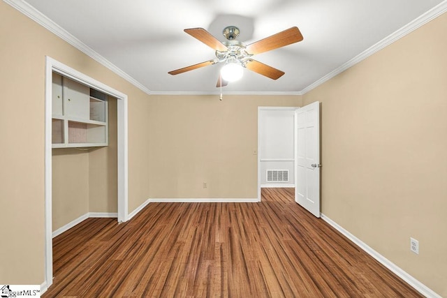 111 Bonwood Ave, Simpsonville, SC 29681 - unfurnished bedroom with crown molding, wood finished floors, a ceiling fan, and a closet
