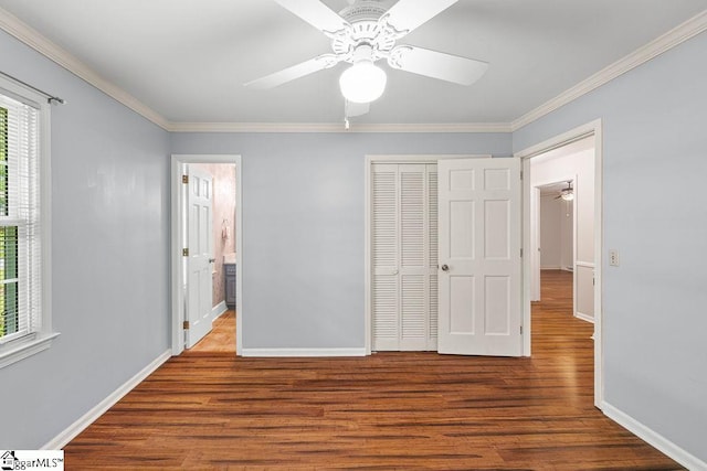 111 Bonwood Ave, Simpsonville, SC 29681 - unfurnished bedroom featuring wood finished floors, multiple windows, a closet, crown molding, and ceiling fan