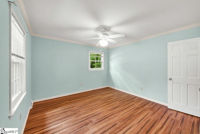 111 Bonwood Ave, Simpsonville, SC 29681 - unfurnished room with wood finished floors, a ceiling fan, and crown molding