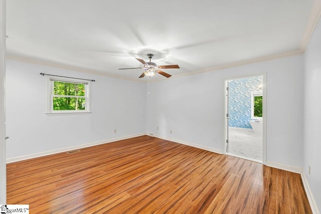 111 Bonwood Ave, Simpsonville, SC 29681 - spare room featuring wood finished floors, ceiling fan, plenty of natural light, and ornamental molding