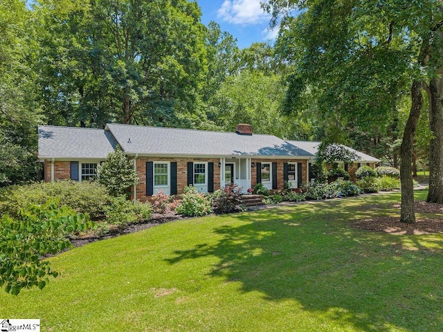 111 Bonwood Ave, Simpsonville, SC 29681 - ranch-style home with brick siding, a chimney, and a front yard