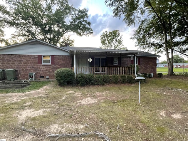 504 N Adair St, Clinton, SC 29325 - rear view of house with brick siding and a porch