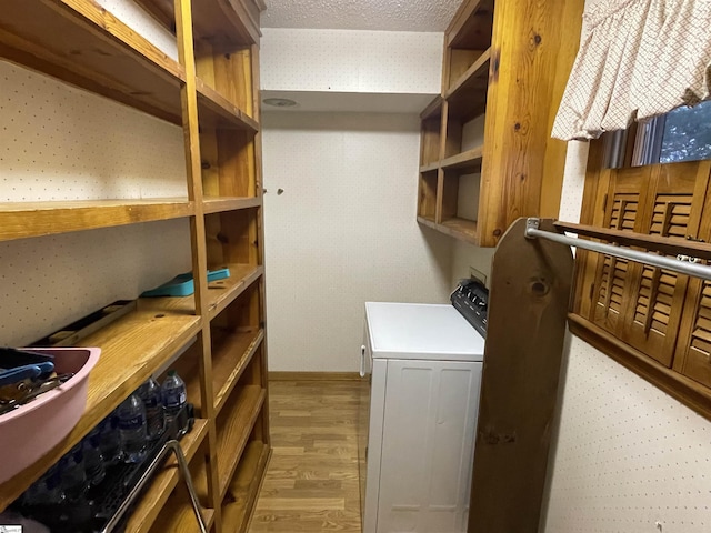 504 N Adair St, Clinton, SC 29325 - laundry area with light wood finished floors and independent washer and dryer