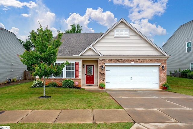 710 Westwood Rd, Lyman, SC 29365 - traditional home with brick siding, driveway, a front yard, a garage, and a shingled roof